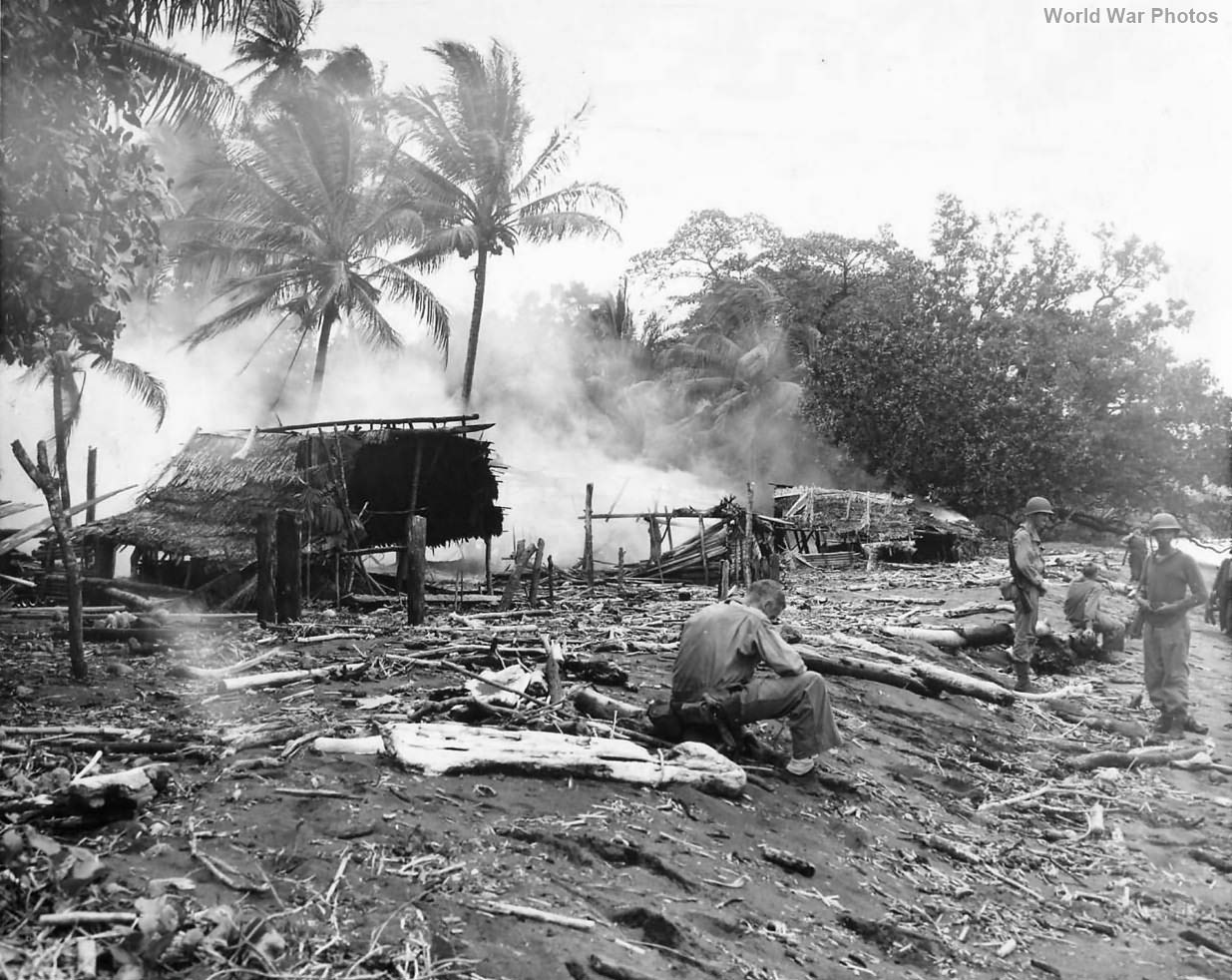 Marine patrol in native village Gurissu New Britain 1944