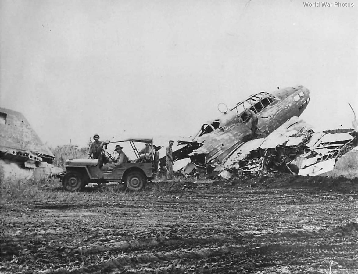US and Australian troops inspect downed G4M at Lae 1943