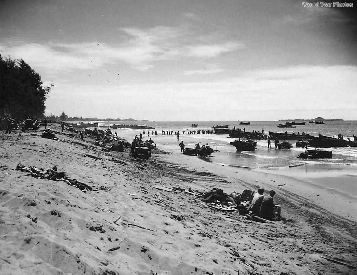 US troops and vehicles along the invasion beach at Korako