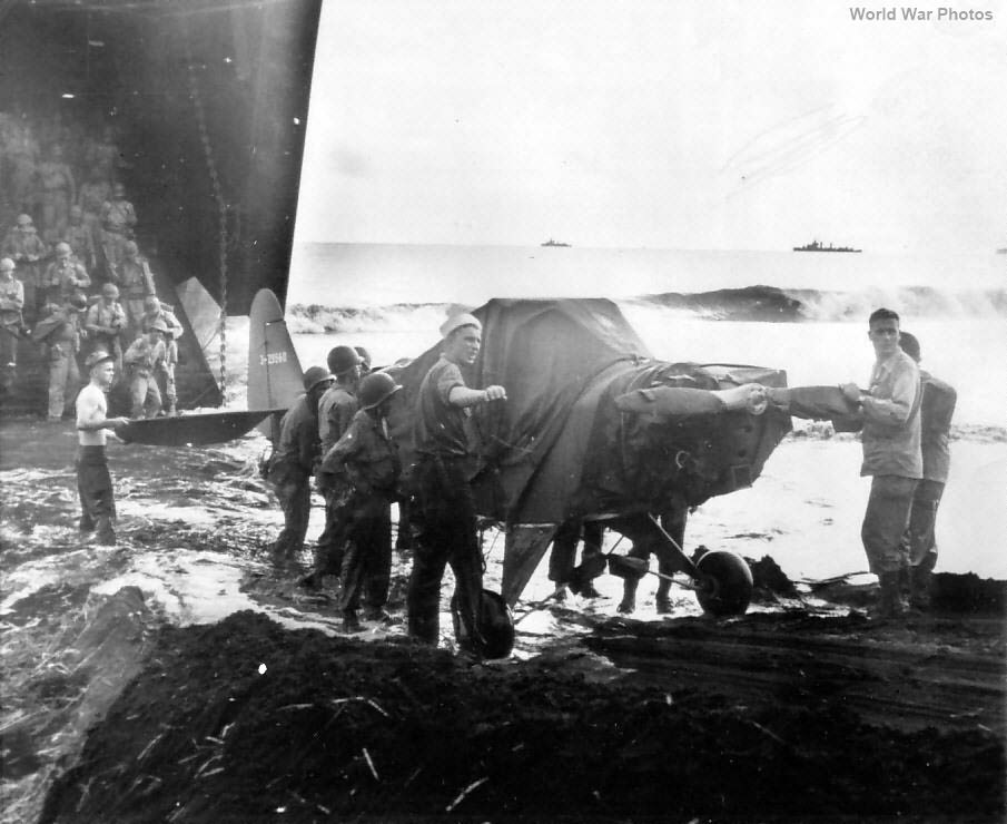 Unloading L-4 on Wakde 1944