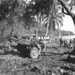 Allied troops set up M2A1 105mm howitzer in Depapre New Guinea 1944