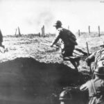 Japanese infantrymen leaving a trench near Buna during fighting in New Guinea 43