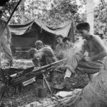 US soldiers with captured Japanese Type 97 anti-tank gun at Hollandia 1944
