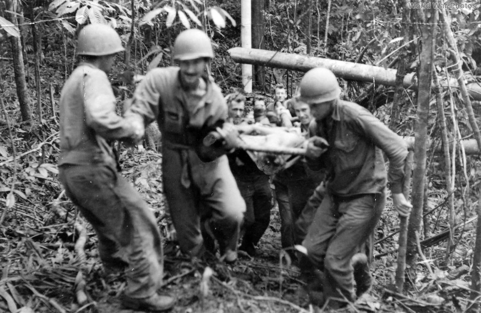 Carring wounded GI on Mount Tambu September 3, 1943