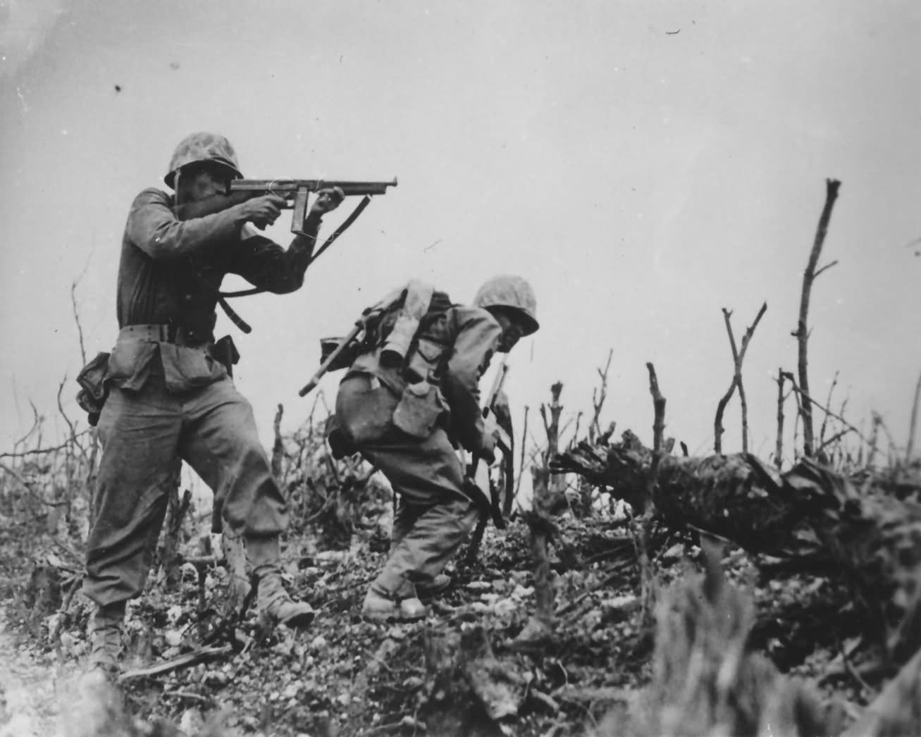 1945 Okinawa1st Div. Marine firing tommy gun