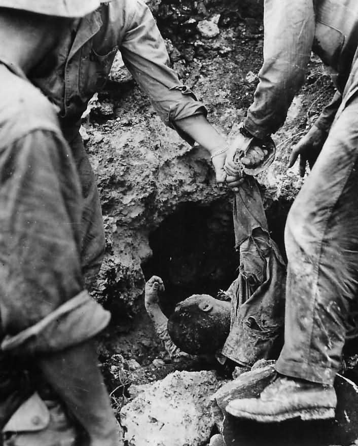 6th Division Marines Pull Wounded Japanese from Cave on Okinawa
