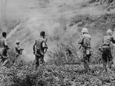 Japanese soldier surrenders to Marines in Cane Field Okinawa