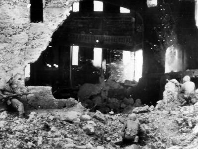 Marine Tosses Phosphorus Greanade at Sniper on Okinawa