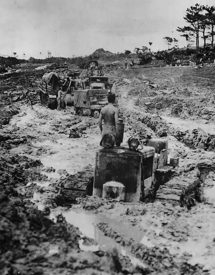Tractor Jeep and M7 Priest Stuck in Mud on Okinawa 1945