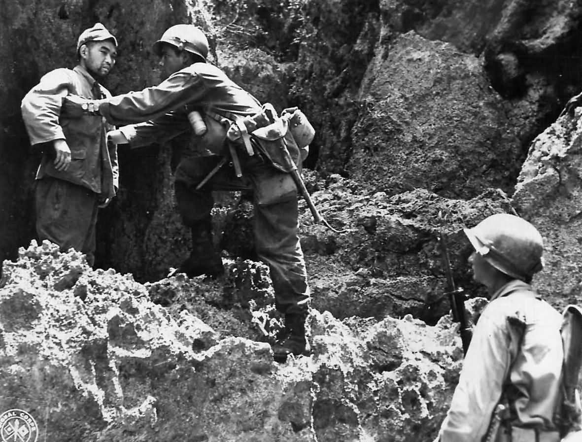 US 10th Army Rifleman With The 32nd Infantry 7th Division Searches A 