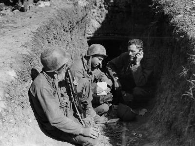 US Soldiers in Dugout Call Station on Okinawa 1945