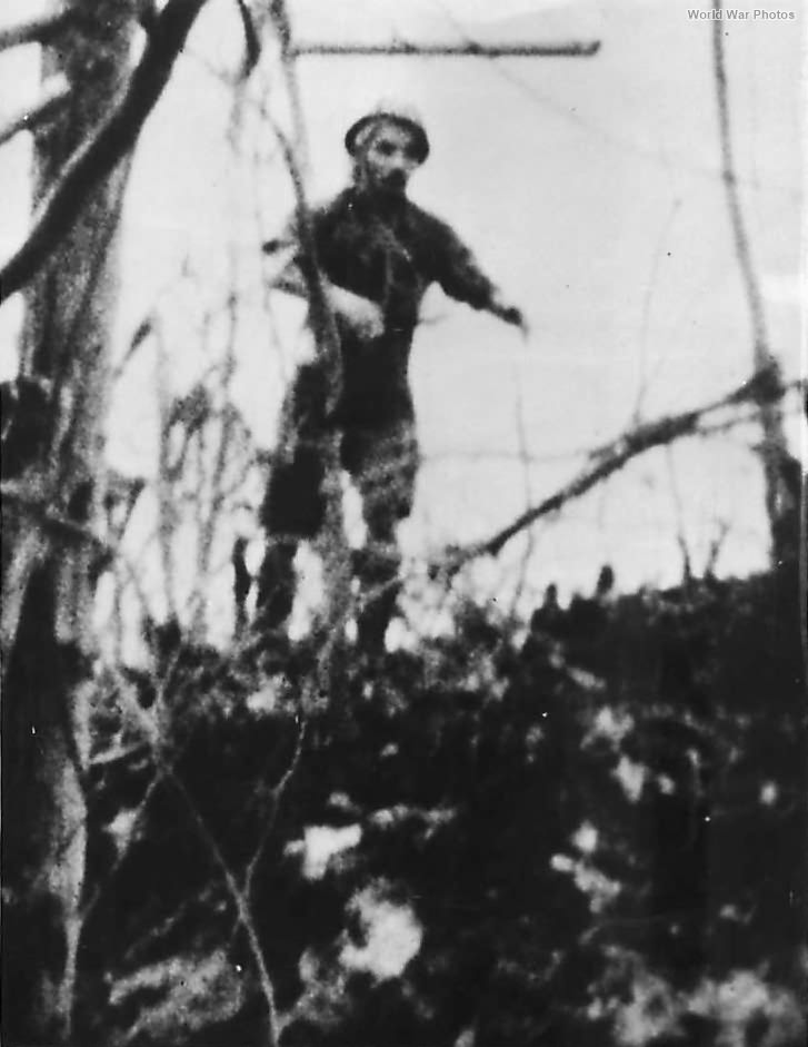 Japanese Soldier Throwing Bangalore at Marine Tank on Peleliu