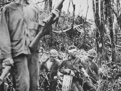 Marines on Peleliu Evacuate Comrade Wounded by Sniper Fire