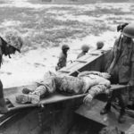 Wounded 1st Division Marine Being Evacuated from Peleliu Beach