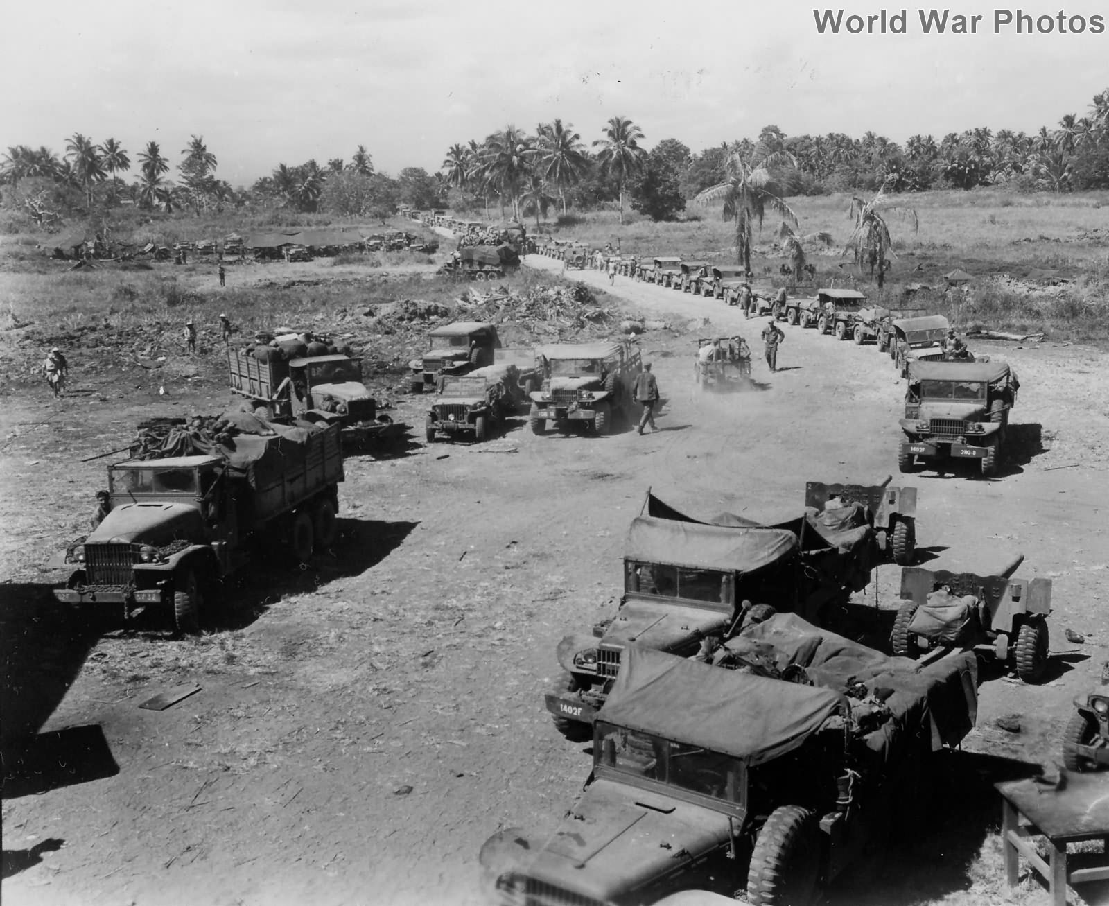 32nd Infantry Division 6×6 trucks and 57mm AT guns, Mindanao 1945
