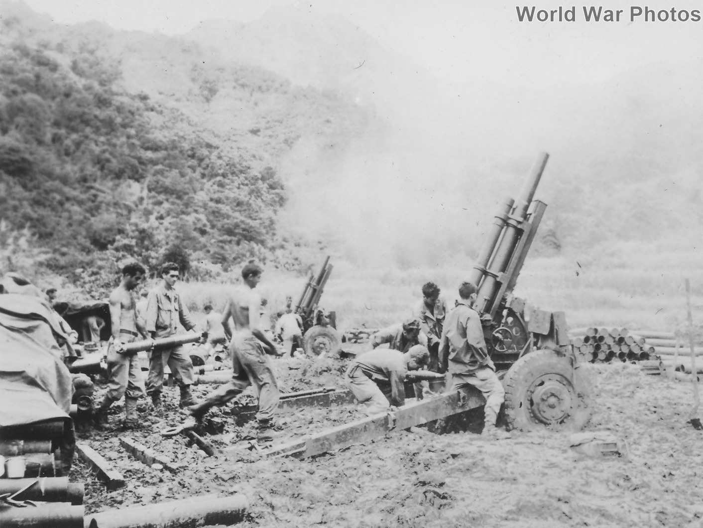 33rd Infantry Division 105mm howitzer firing, Butac 10 June 1945