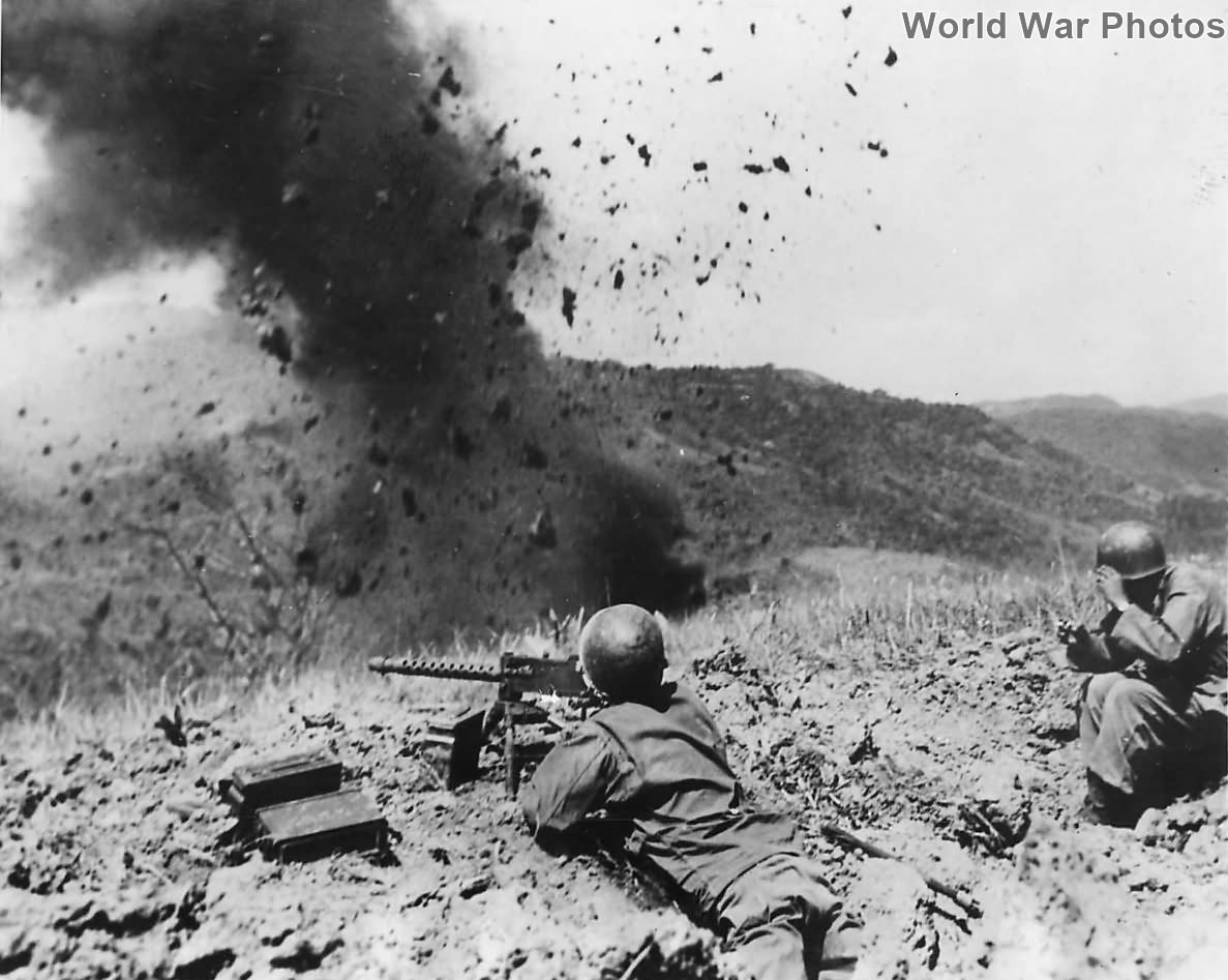 38th Division troops blast Japanese position on Luzon