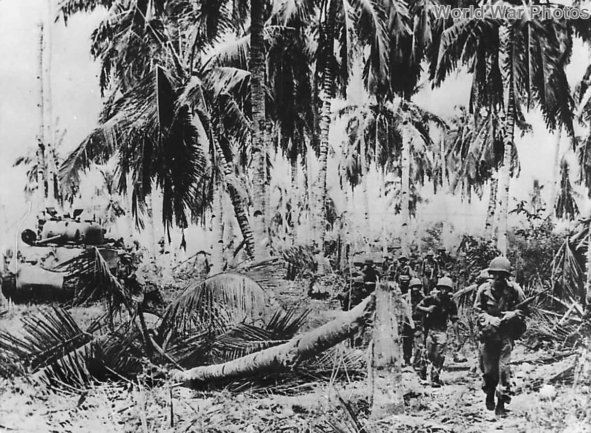 41st Division Soldiers moving inland on Mindanao 1945