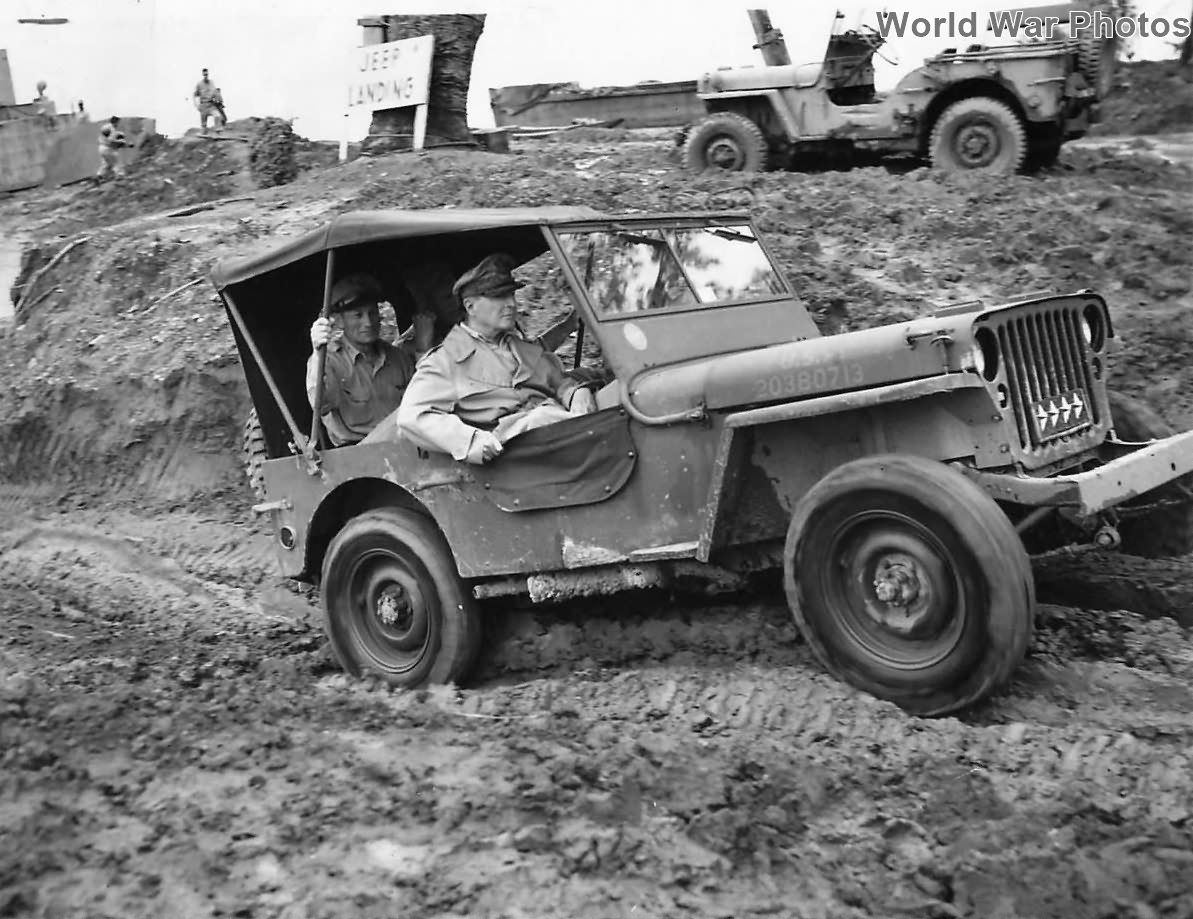 Gen MacArthur riding in Jeep at Jeep Landing on Leyte 1944