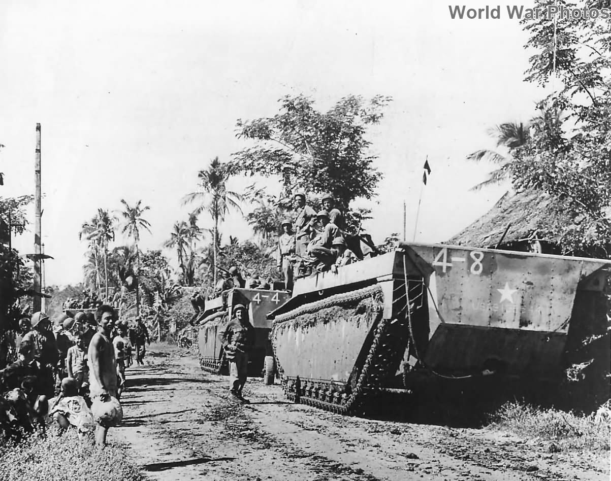 Soldiers and LVTs advancing in Binmaley Luzon 1945