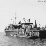 DUKW transfers wounded to QS-2 Ship Mindanao 1945