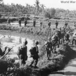 Gen. MacArthurs troops advance near Binmaley on Luzon