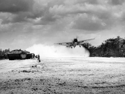 1st US Plane (TBF Avenger) takes off Aslito Airfield Saipan