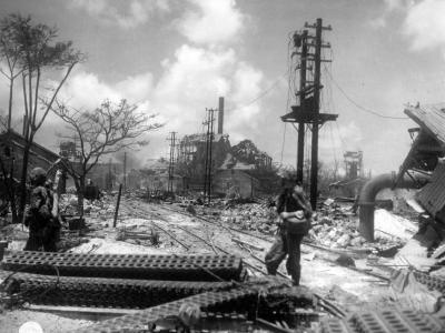 GI’s at wreckage of Japanese sugar mill Saipan