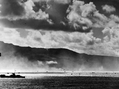 Japanese Plane Falls into Sea as US Landing Craft Storm Saipan