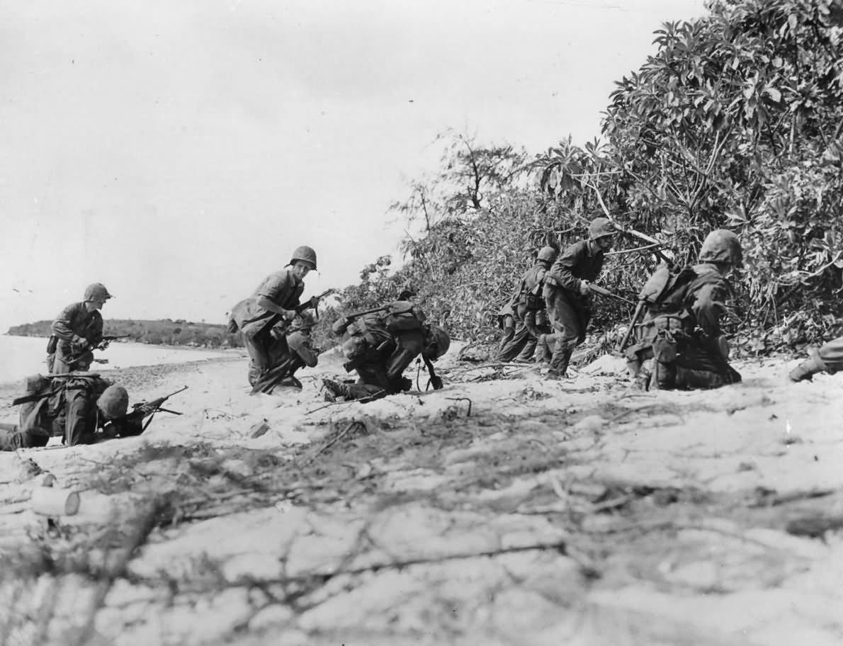 Marines Hit by Japanese Sniper on Saipans Red Beach 1944