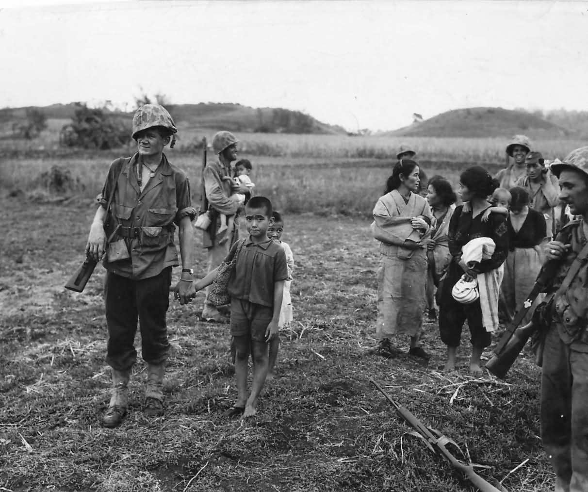 Marines Lead Japanese Women and Children to Safety on Saipan