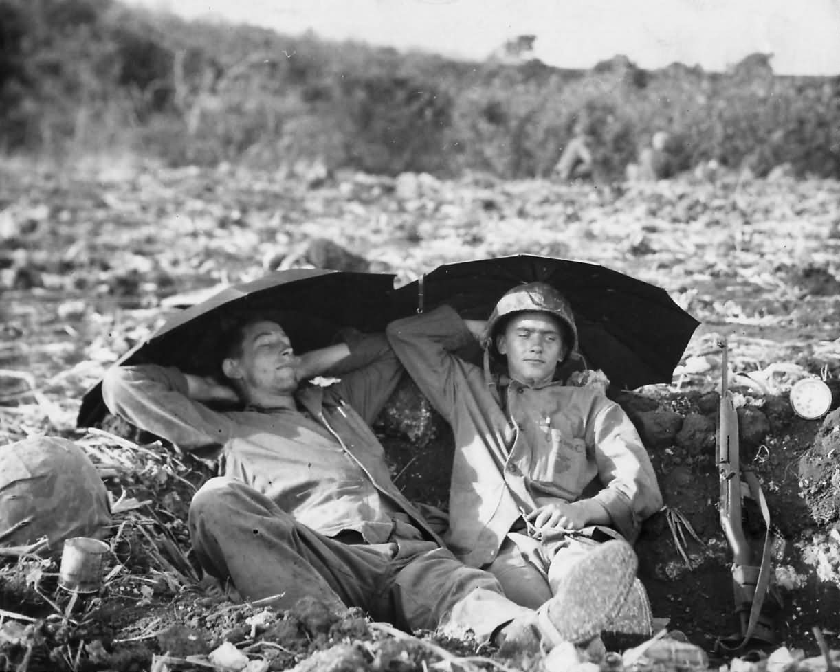 Marines Resting in Foxhole after Battle on Saipan