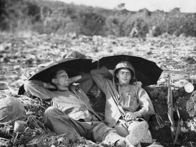 Marines Resting in Foxhole after Battle on Saipan