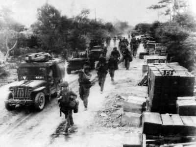 Marines and Jeeps Advance to Front Lines on Saipan