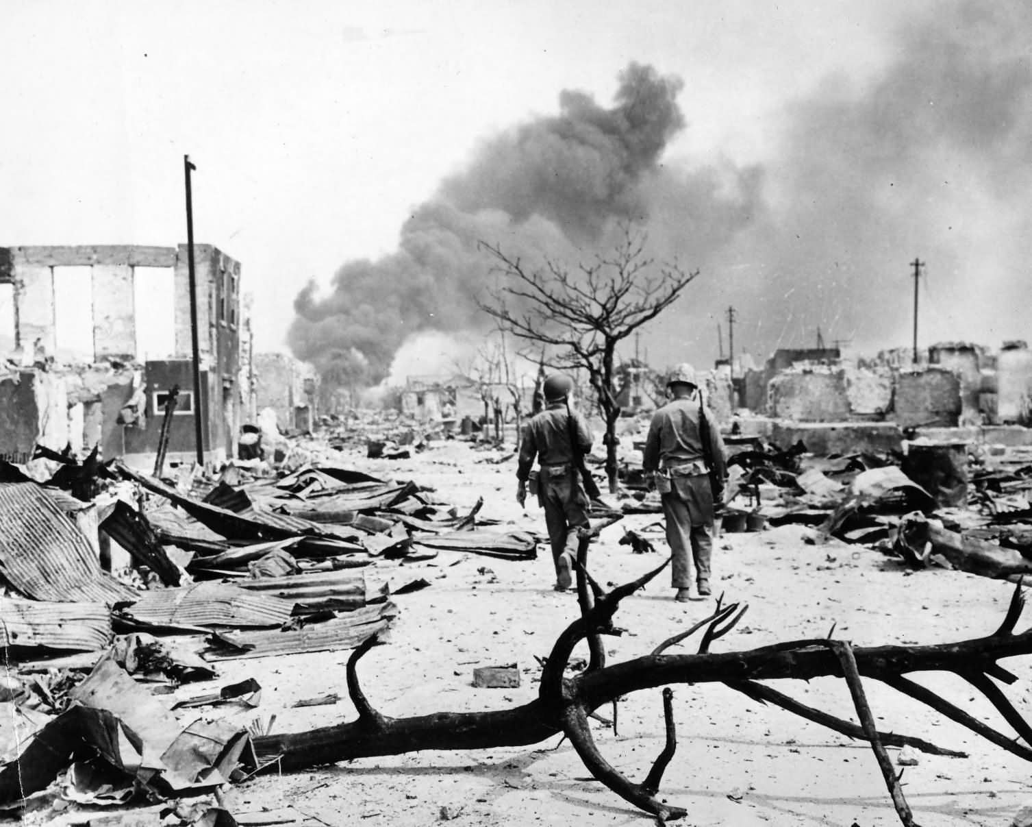 Marines enter blitzed Garapan 1944 Saipan