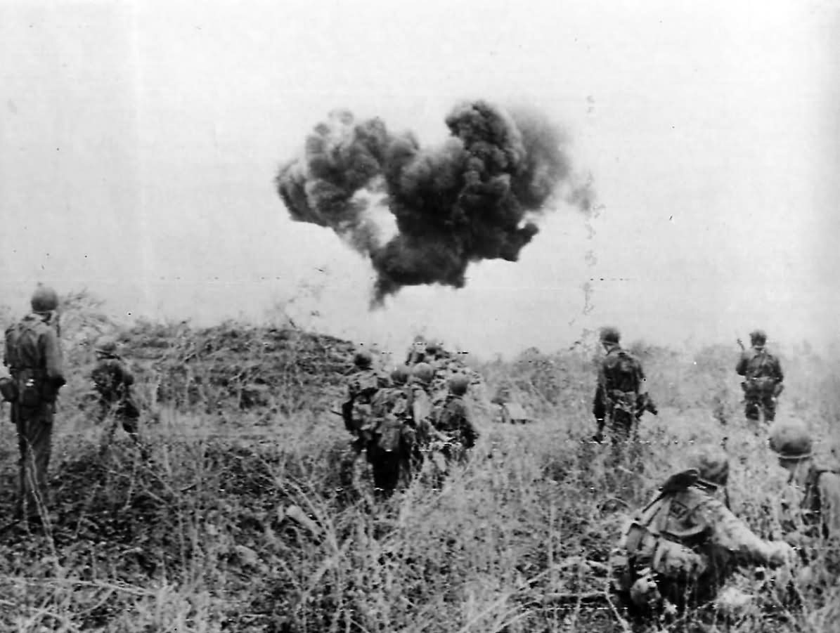 Soldier Blasts Japanese pillbox with Flamethrower on Saipan