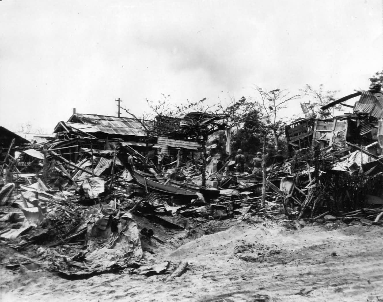 Wrecked bombed ruins of Charin Kanoa on Saipan 26 June 1944