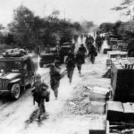 Marines and Jeeps Advance to Front Lines on Saipan
