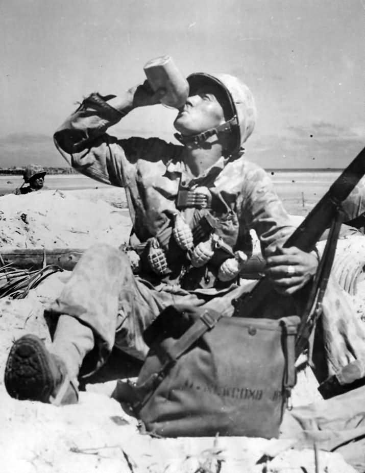 Marine with Grenades and Ammo on Tarawa Beach 1943