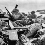 2nd Marine Division Riflemen pinned down Betio Island