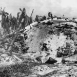 Dead Japanese soldiers atop pillbox