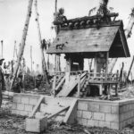 Marine examines ruins of shinto temple on Tarawa