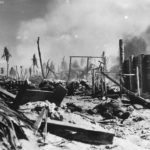 Marine searches wreckage for wounded buddies on Tarawa
