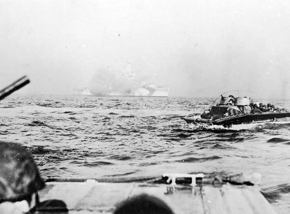 LVT loaded with Marines approaches Tinian 1944