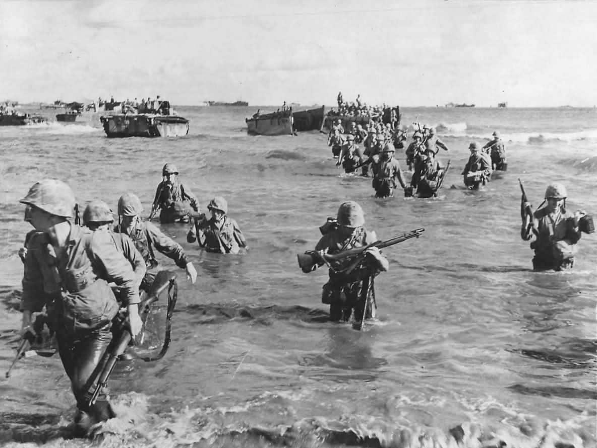 US Marines Wade Ashore on Tinian from Landing Barges and LVT