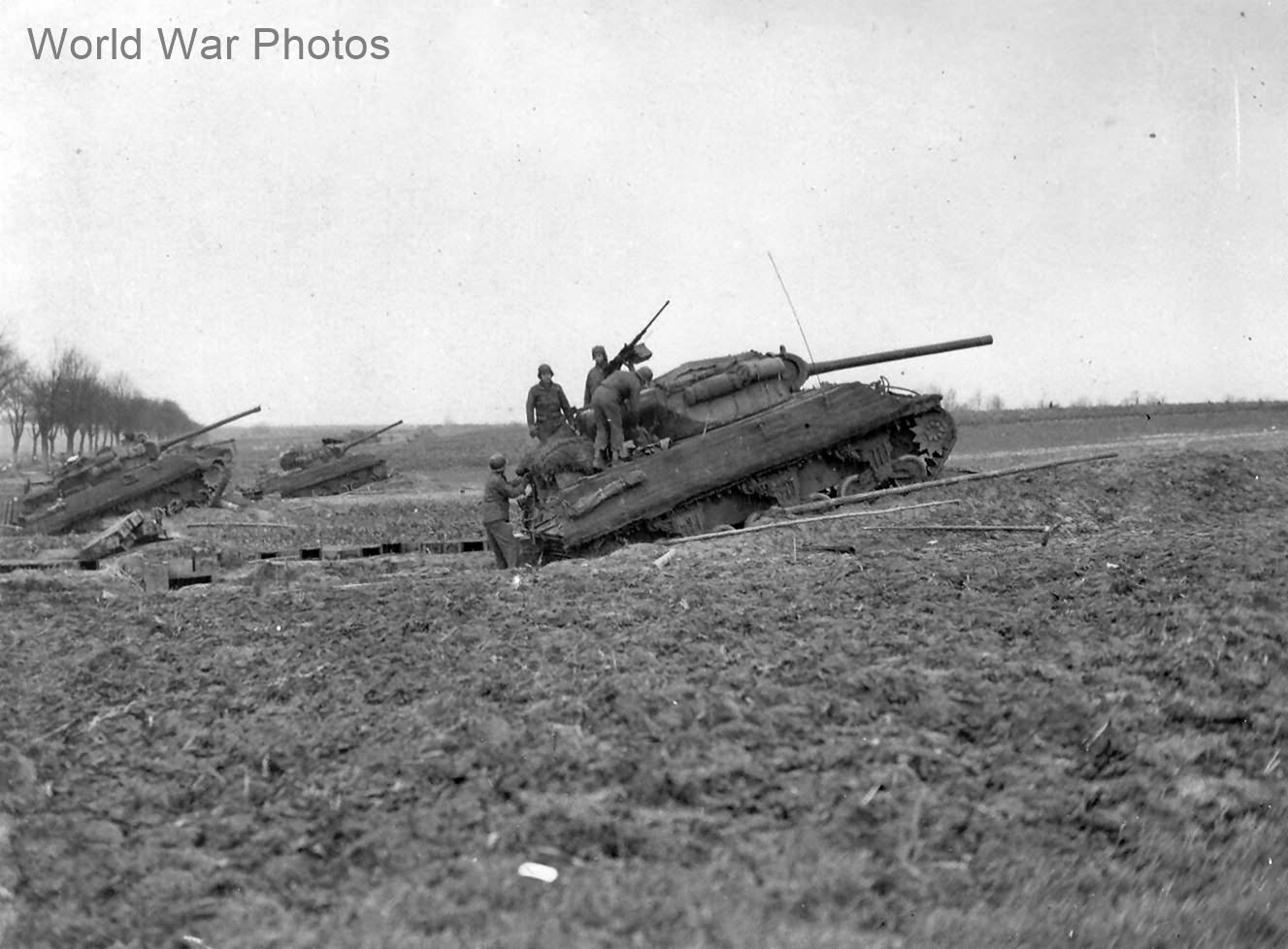 M10s firing across Roer River