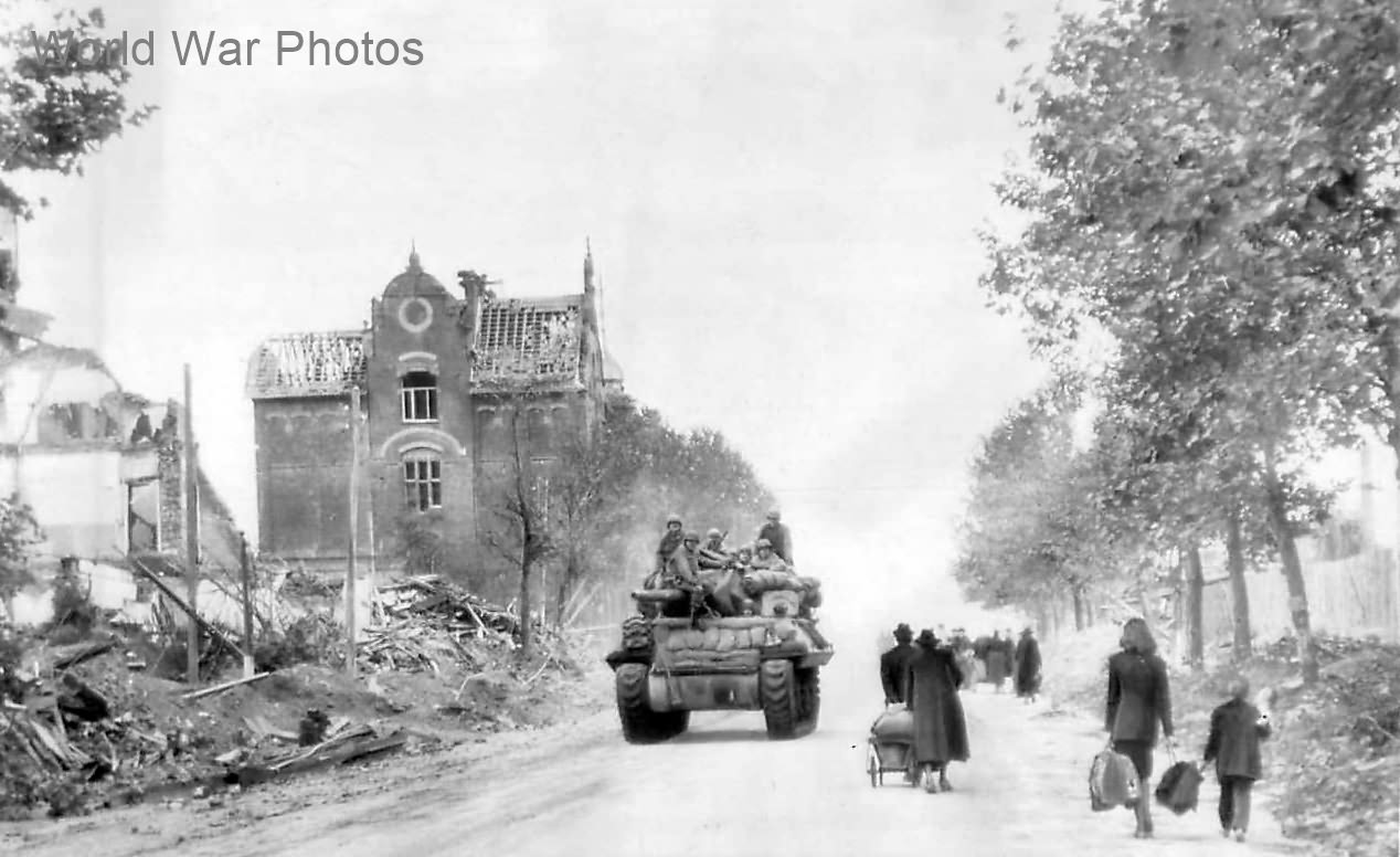 Civilians leave for Allied lines as M10 enters Aachen