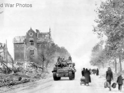 Civilians leave for Allied lines as M10 enters Aachen