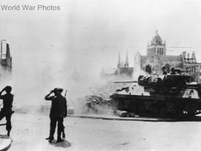M10 fires at German tank in Orleans France 1944