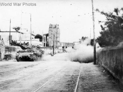 M10 blasts German machine gun position in Rome 6 June1944